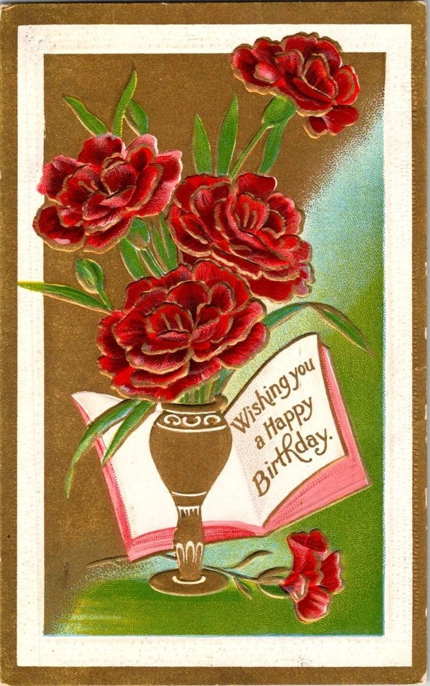 Embossed birthday postcard with red carnations in a white vase, gilded border