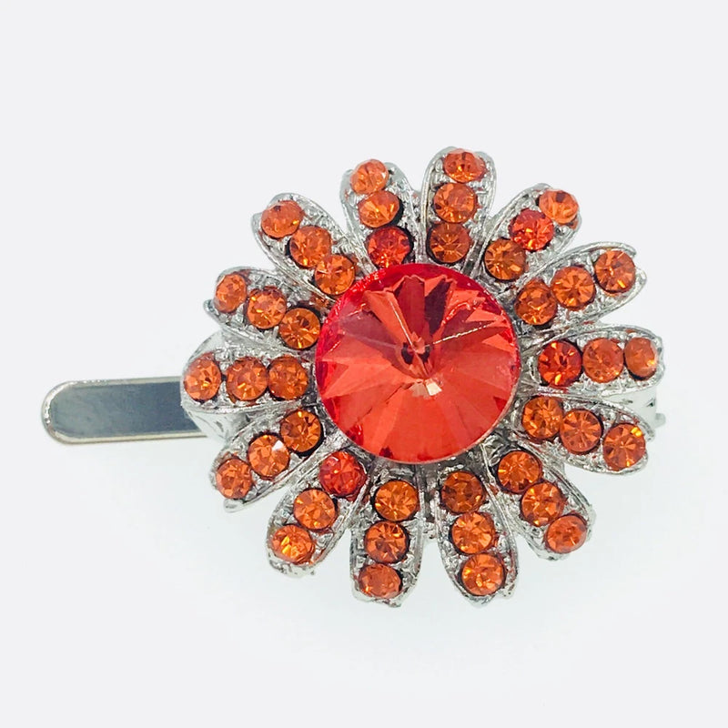 Orange rhinestone sunflower hair clip with silver-tone metal barrette back