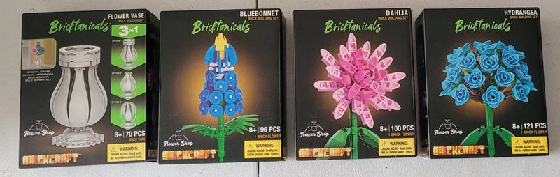 Bricktanicals flower shop building set, boxed with blue and pink flower designs