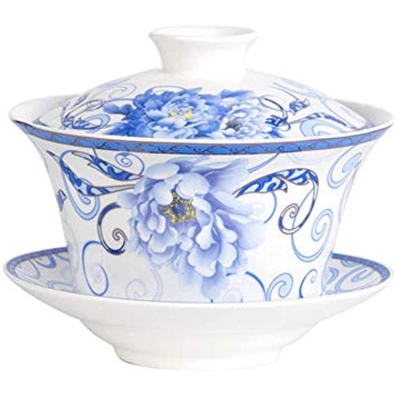 Porcelain gaiwan tea cup with blue peony floral lid and saucer