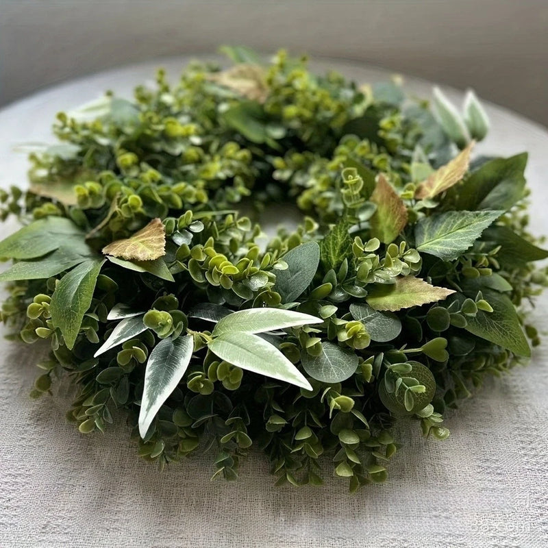 Artificial eucalyptus vine wreath with green leaves and buds, spring home decor