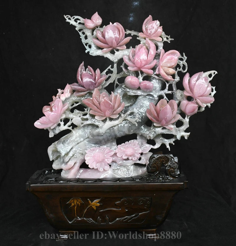 Pink peony jade tree sculpture with carved blossoms, mounted on dark decorative base