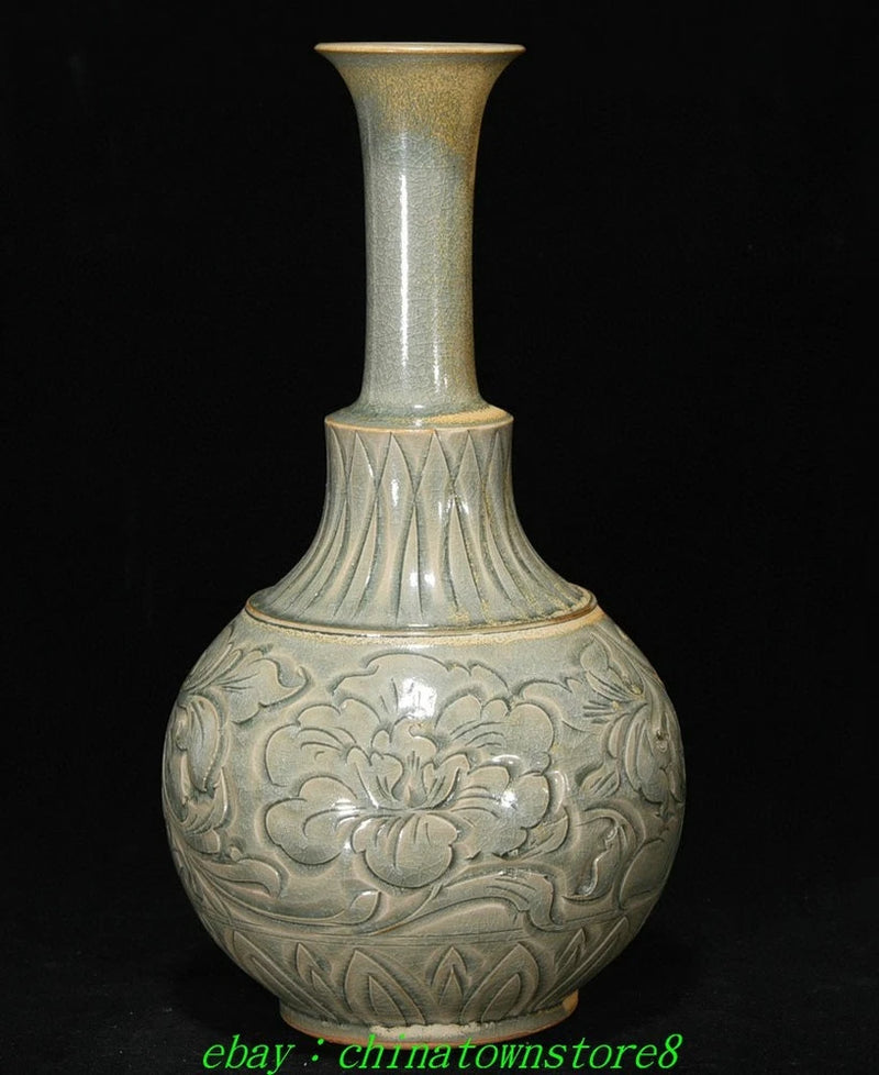 Celadon ceramic vase with embossed peony and geometric bands, narrow neck