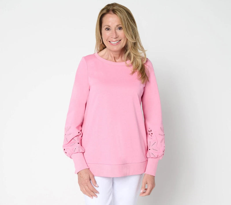 Pink eyelet sleeve sweatshirt with crew neck and lace cuff cutouts