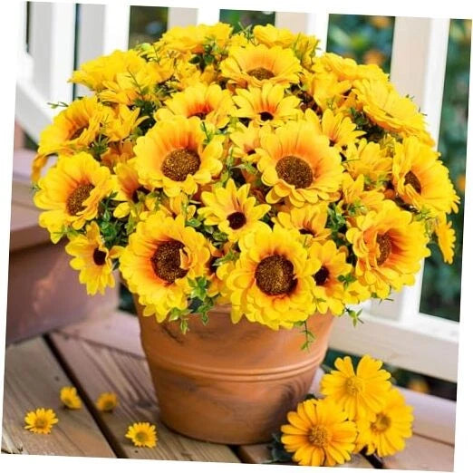 Artificial yellow and orange sunflower bouquet with brown centers, in terracotta pot