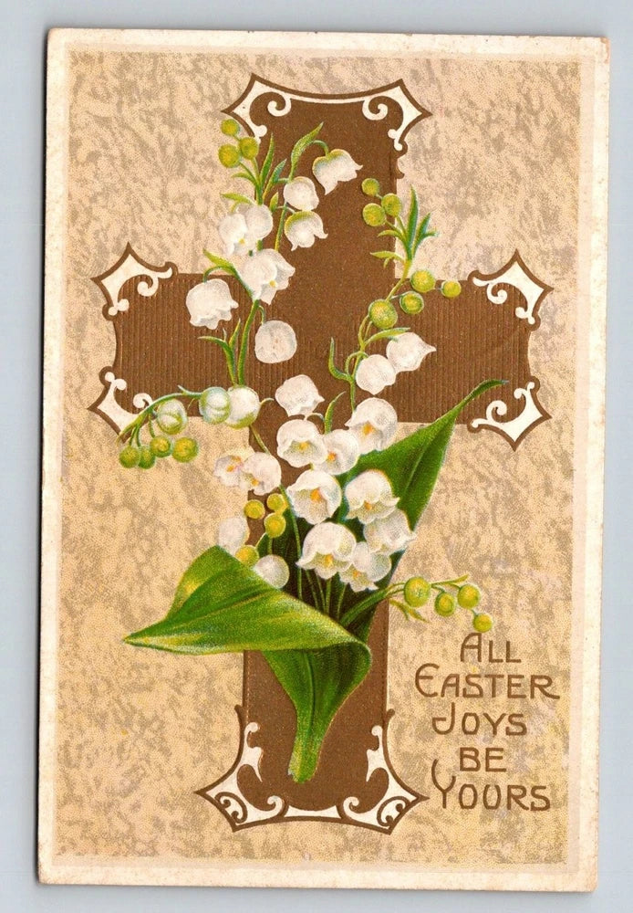 Vintage embossed Easter postcard with lily-of-the-valley flowers and ornate cross frame