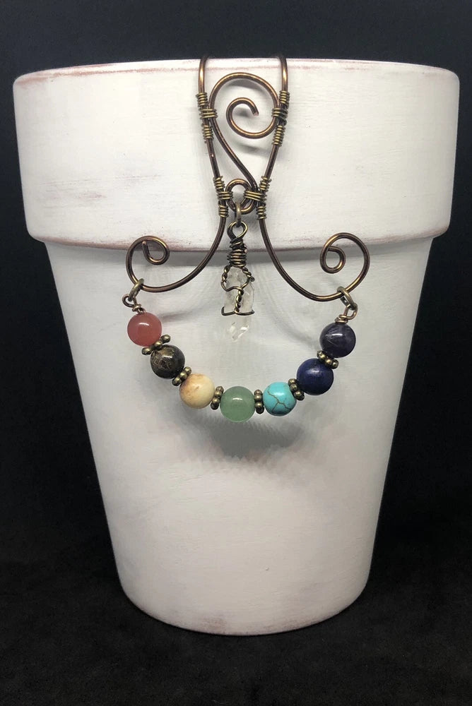 Metal pot hugger with spiral wire and multicolor bead charm accents