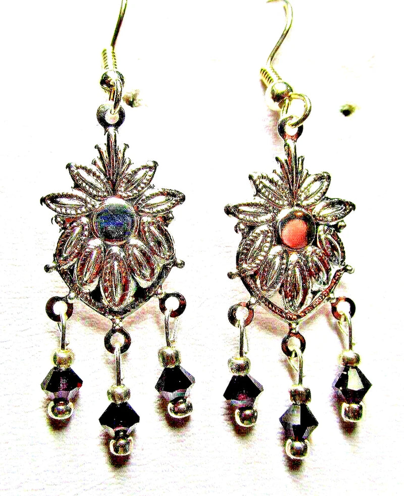 Silver-tone sunflower chandelier drop earrings with red and purple centers, black bead dangles
