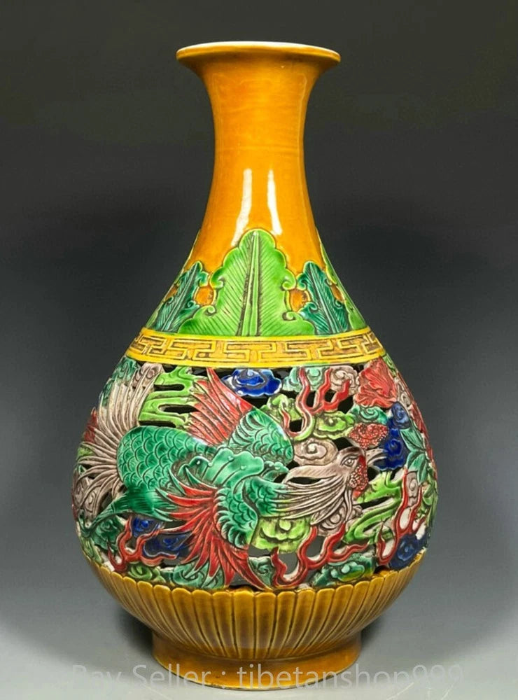 Yellow porcelain bottle vase with multicolored phoenix and peony-style floral design