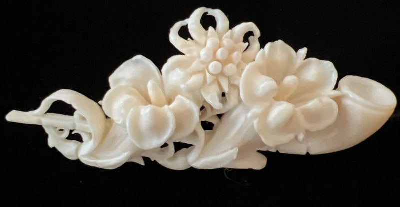 Victorian lily flower brooch pin with white carved trumpet blooms