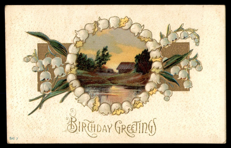 Birthday greetings postcard with lily of the valley wreath around a landscape and text