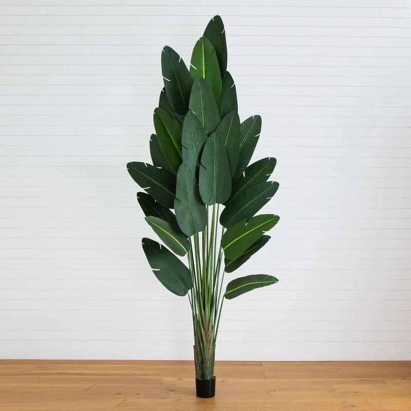 Artificial palm tree home office decor with green leaves and stems in black pot