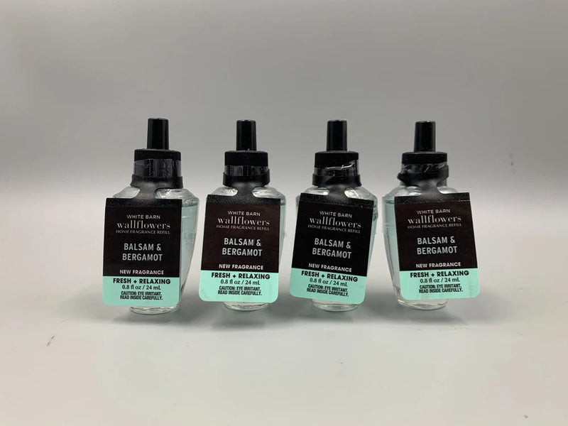 Bath & Body Works wallflower fragrance bulbs set of 4, teal bottles with black tops