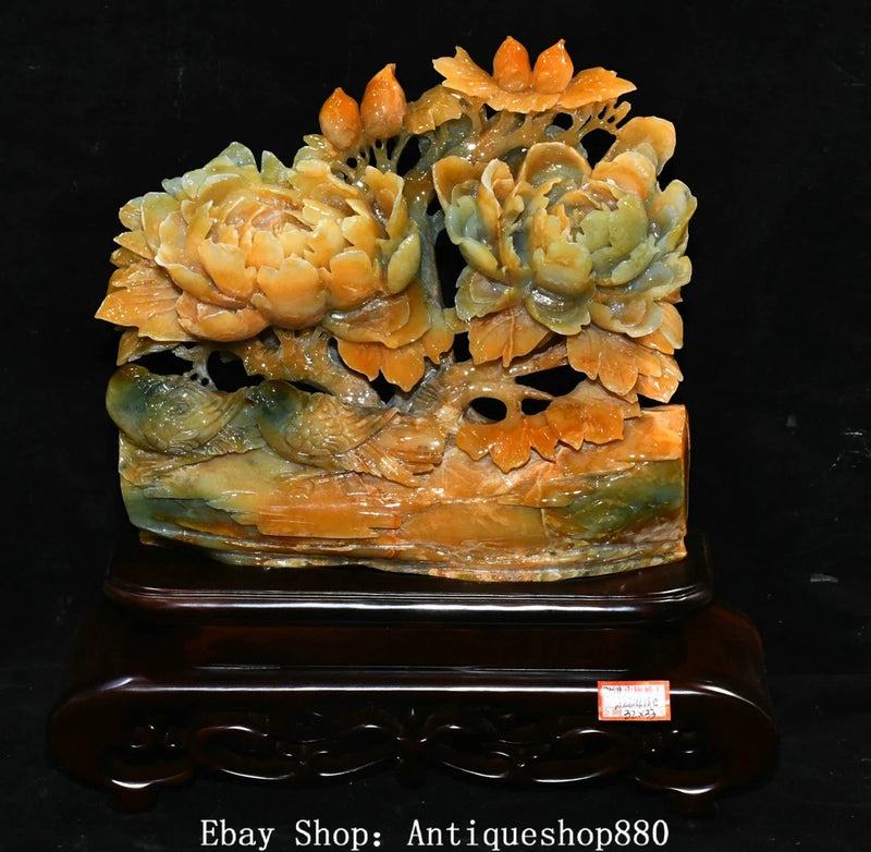 Peony flower and bird motif jade carving statue on ornate base