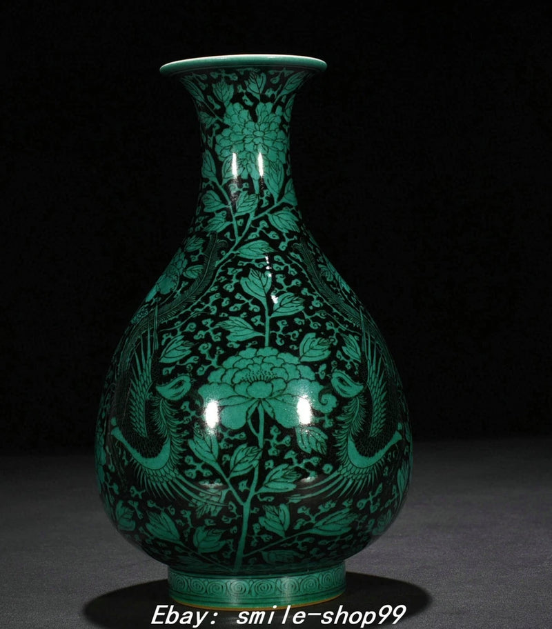 Green glaze porcelain bottle vase with carved phoenix and peony floral pattern