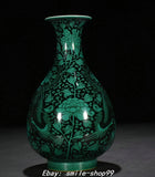 Green glaze porcelain bottle vase with carved phoenix and peony floral pattern