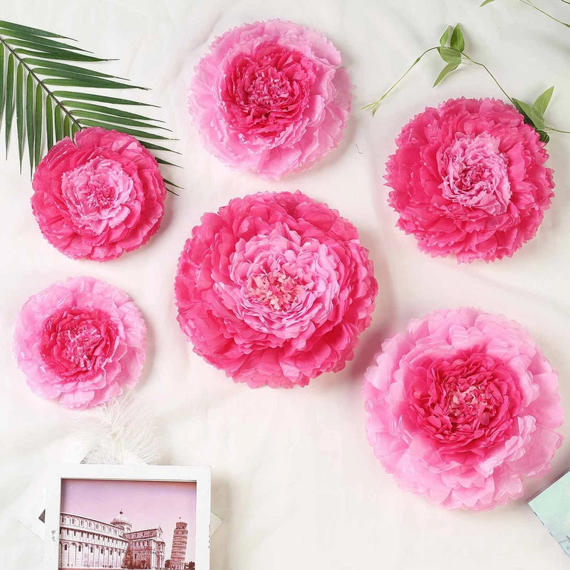 Pink and fuchsia tissue paper carnation flowers, multiple round pom blooms on stems
