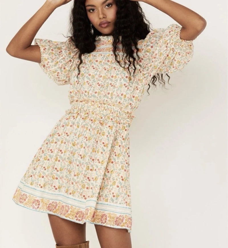 Floral mini dress with puff sleeves and gathered waist, pastel pink and green flowers