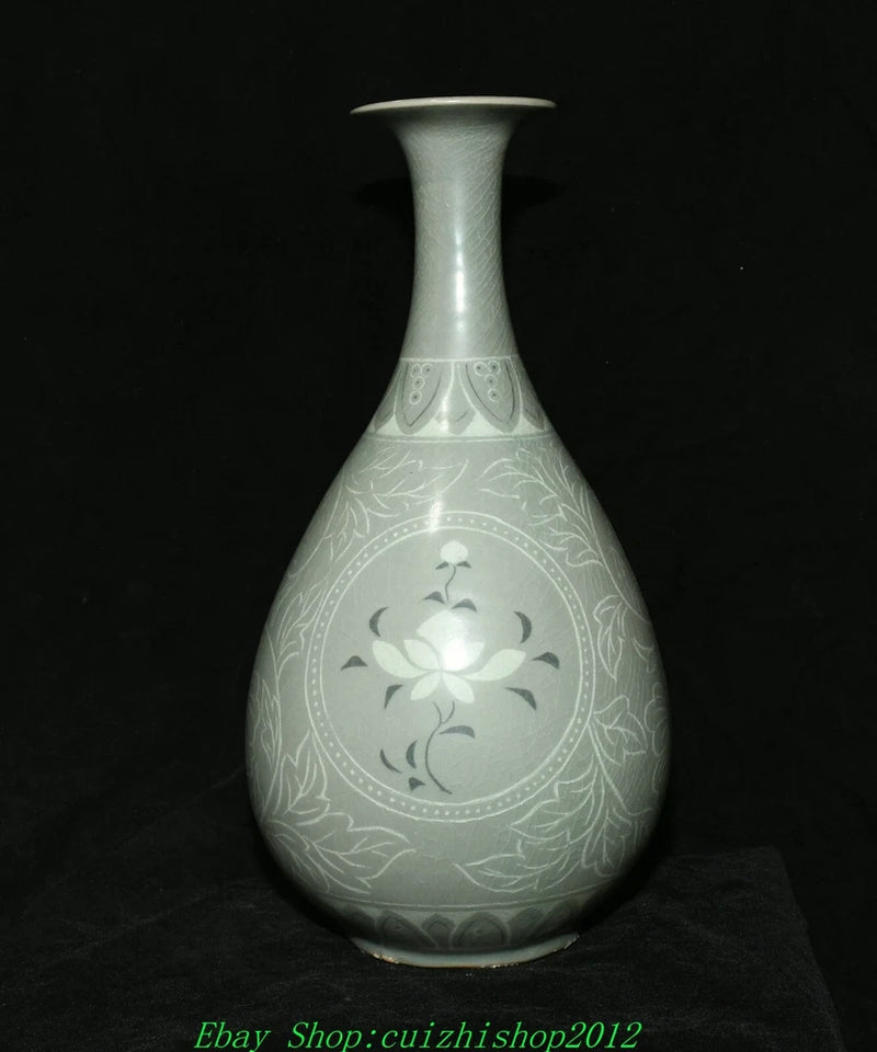 Light blue porcelain vase with peony and floral pattern, bulbous bottle shape