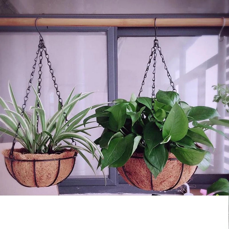 Hanging round flower planters with chain hangers, two woven pots with plants