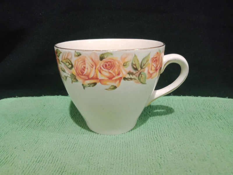 Royal Doulton Golden Rose tea cup with pink and peach rose floral print, white body