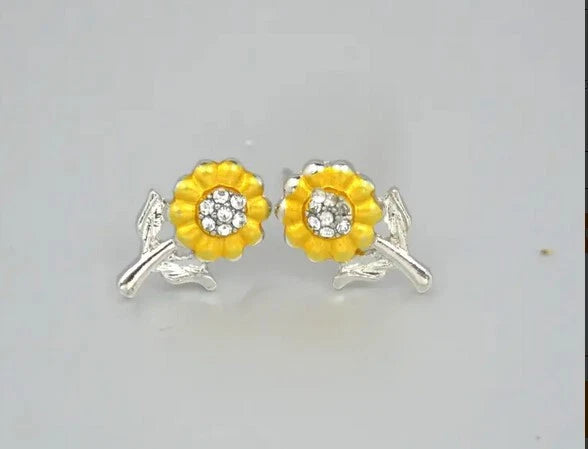 Sunflower crystal stud earrings with silver leaves, yellow center flower and clear rhinestone