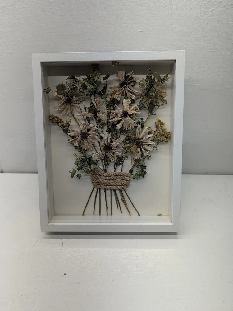 Dried flower arrangement in white framed wall art, bouquet with neutral blooms