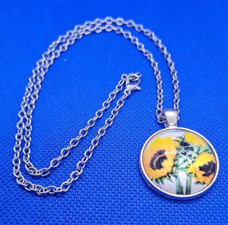 Resin sunflower pendant necklace with silver round charm and linked chain