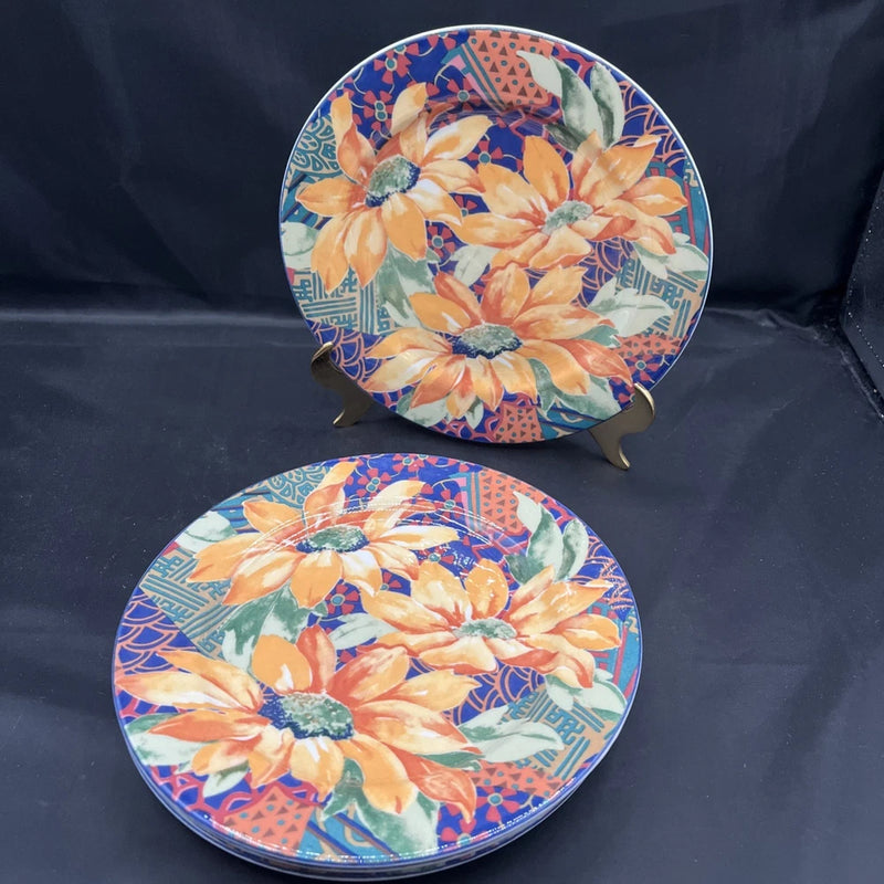 Set of four fine porcelain salad plates with bright sunflower floral pattern