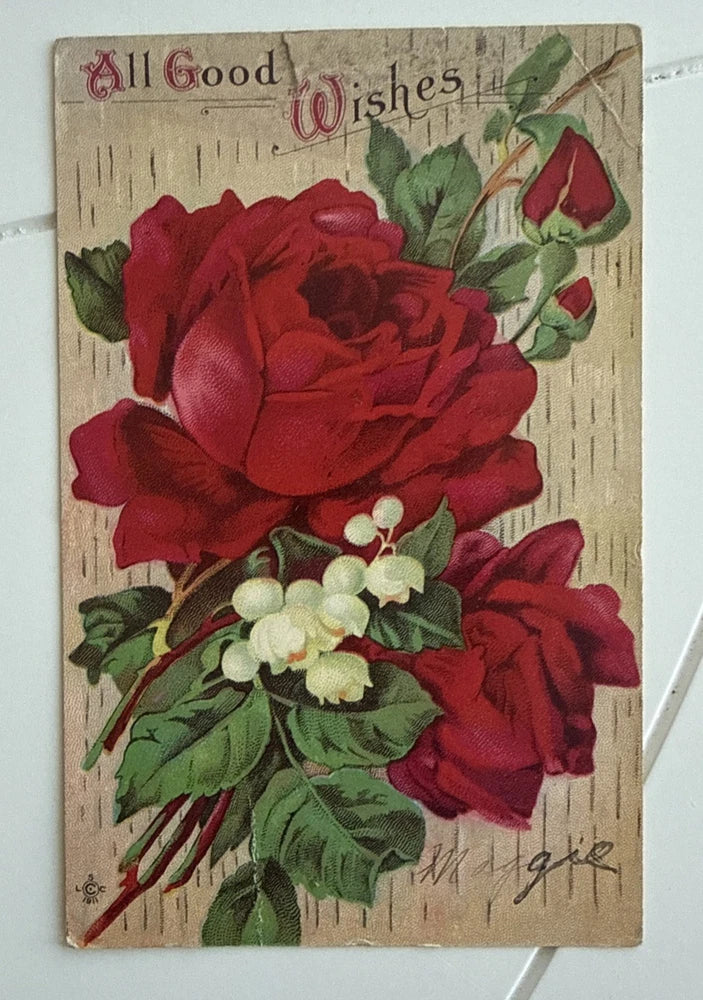 All Good Wishes floral postcard with red roses, white lily-of-the-valley, and green leaves
