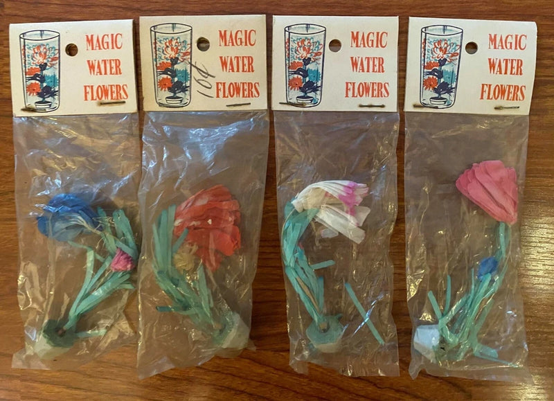 Vintage Magic Water Flowers kit: sealed packets with pink and teal paper flowers