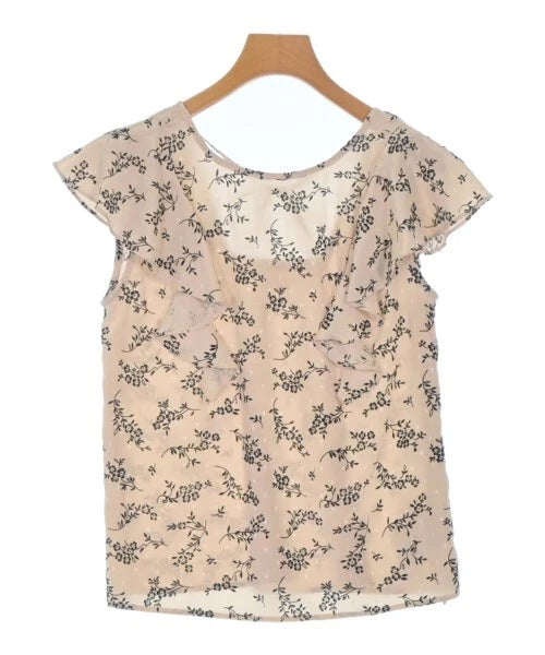 Beige floral ruffle blouse with short sleeves and round neckline
