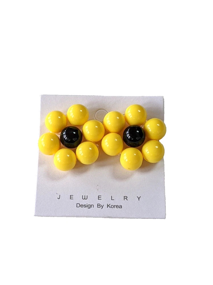 Sunflower bead earrings with yellow acrylic petals and black centers