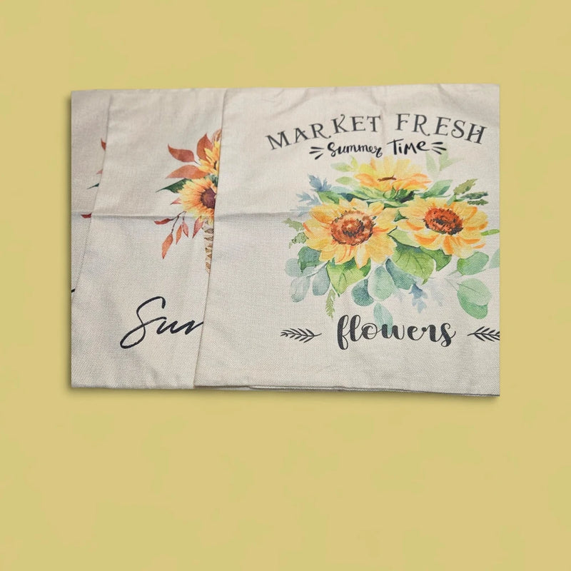 Off-white pillow cover with sunflower floral print and concealed zipper edge