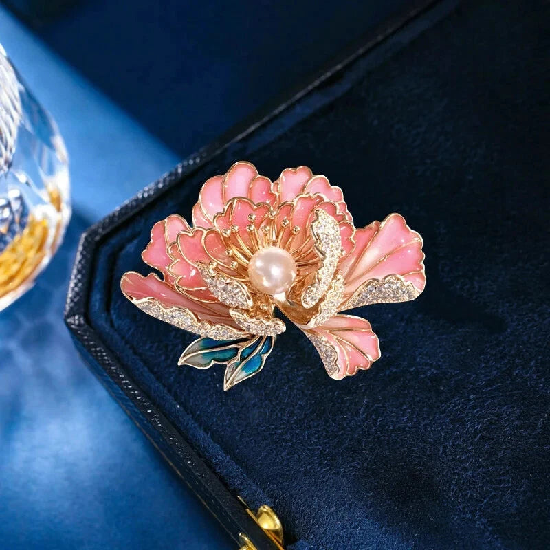 Pink enamel peony brooch with freshwater pearl center and rhinestone gold-tone petals
