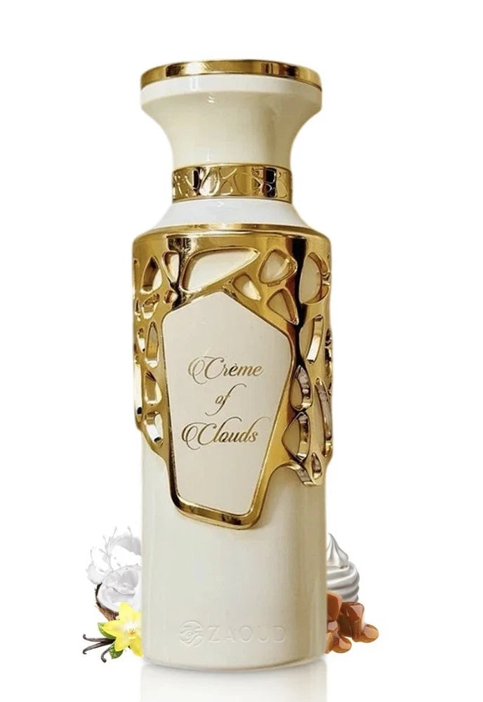 Cream glass eau de parfum bottle with gold cap and ornate gold trim