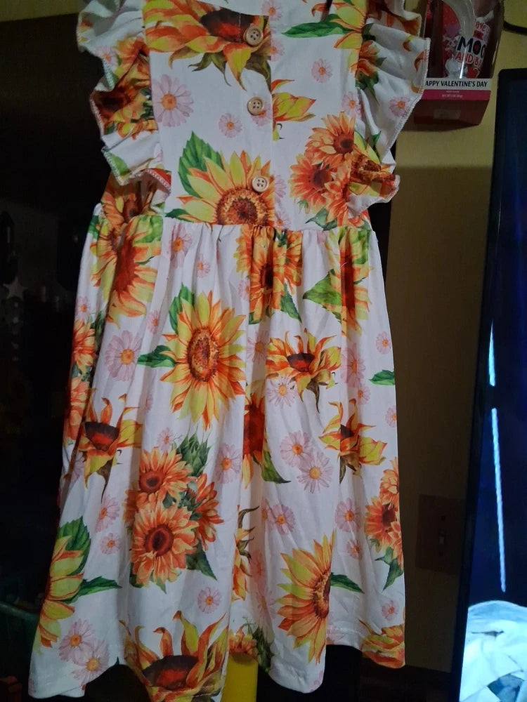 Sunflower-print dress, white with orange floral, short puff sleeves, button front