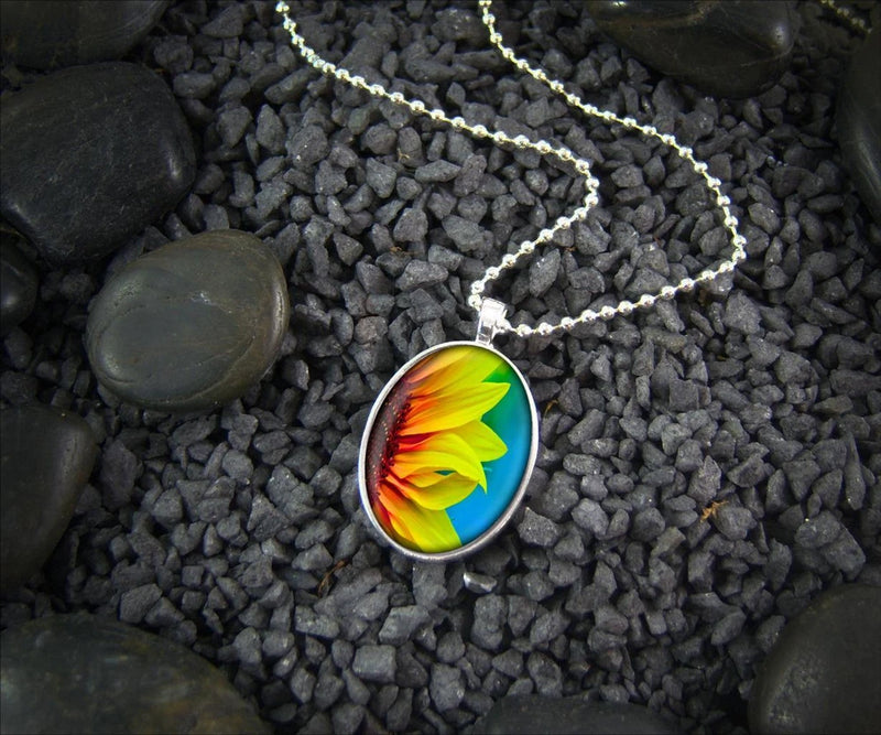 Sunflower glass pendant necklace with silver-tone round pendant on chain