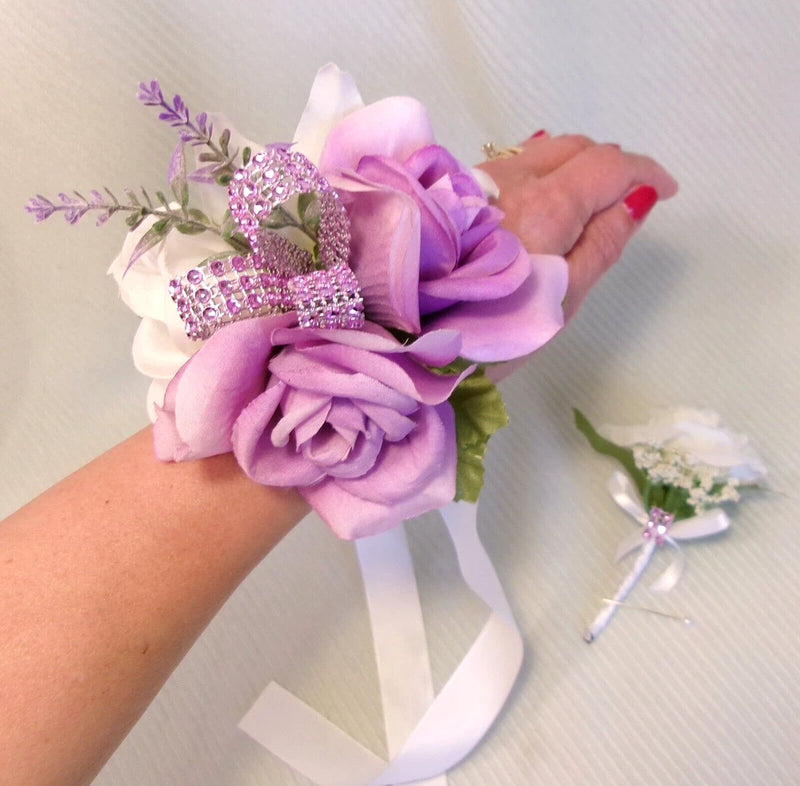 Men's wrist corsage with lavender and white fabric flowers, rhinestone crown, ribbon
