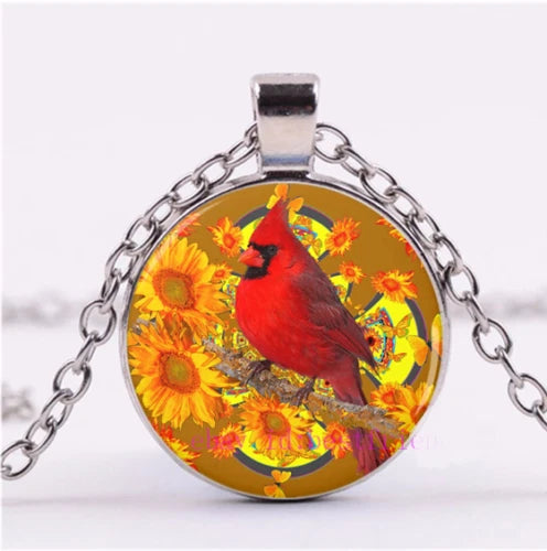Sterling silver necklace with round pendant featuring a red cardinal and sunflowers