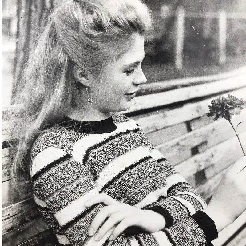 Vintage Black and White Photo Young Woman Looking At Carnation Flower Park Bench Carnation