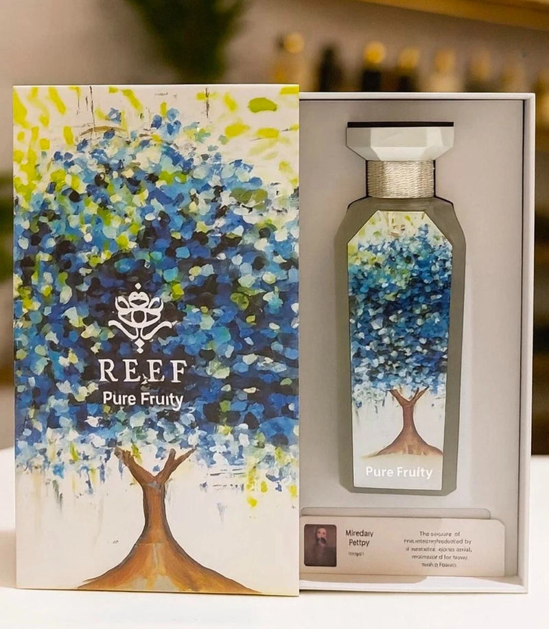 Reef Pure Fruity unisex EDP spray bottle with blue floral-style label, in gift box