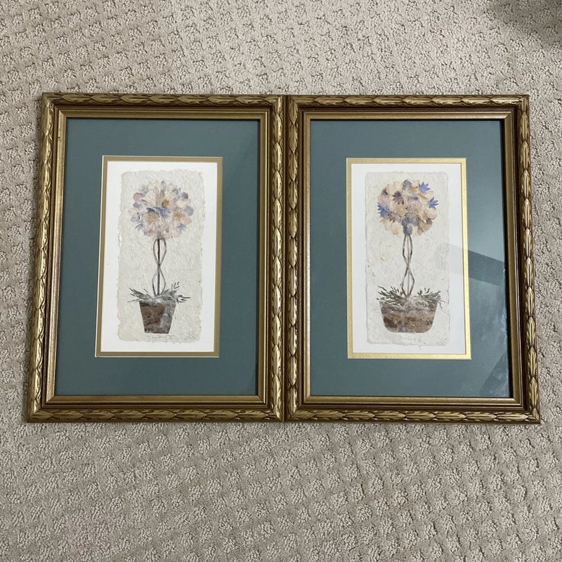 Double set of framed pressed flower wall art with purple blooms in a pot, gold ornate frames