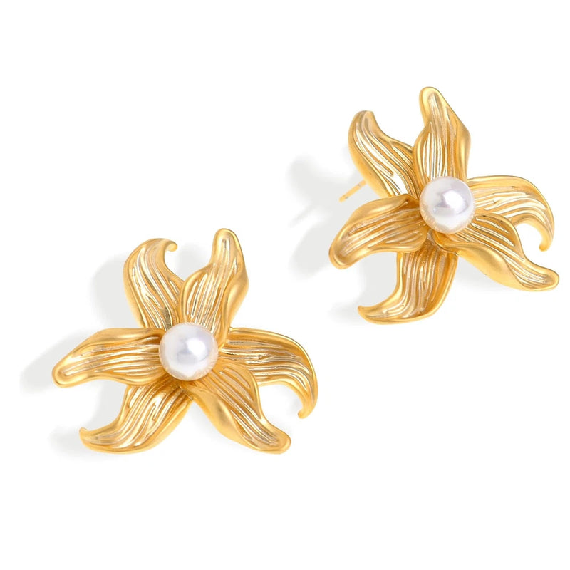 Gold sunflower stud earrings with pearl centers