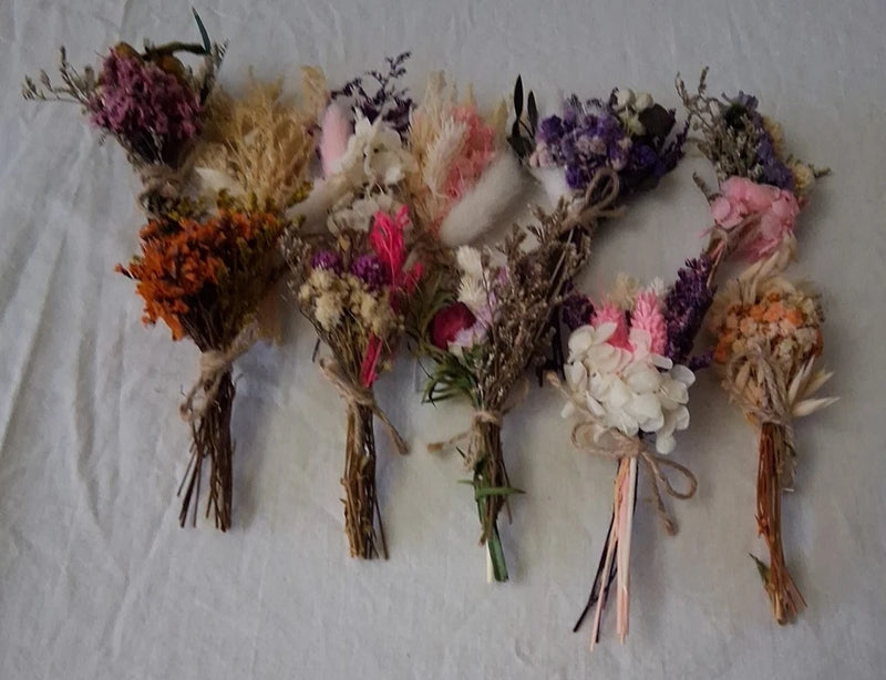 Set of 11 mini dried wildflower bouquets with mixed purple, pink, and white blooms