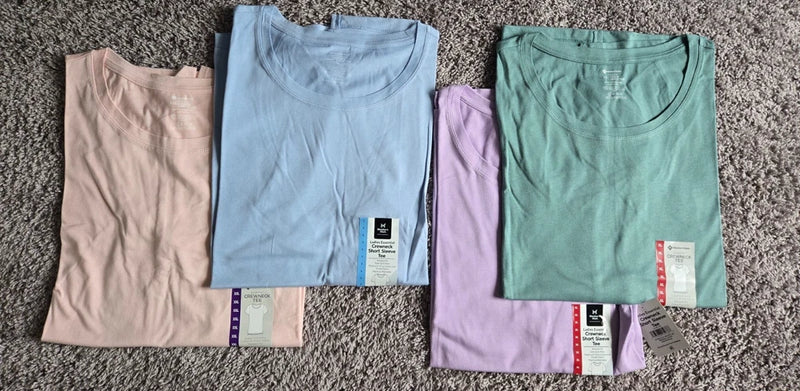 Set of four solid crew-neck short-sleeve T-shirts: blush, light blue, mint, lavender