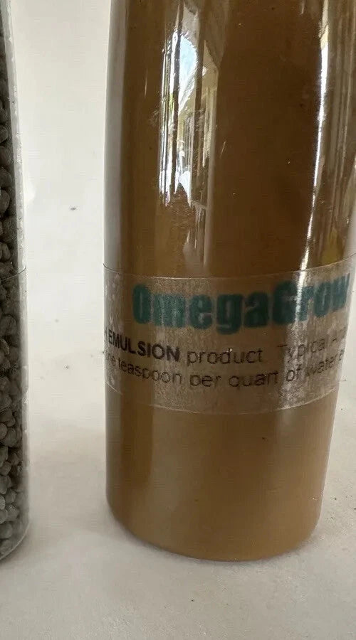 OmegaGrow Orchid fish emulsion bottle, brown plastic with green label