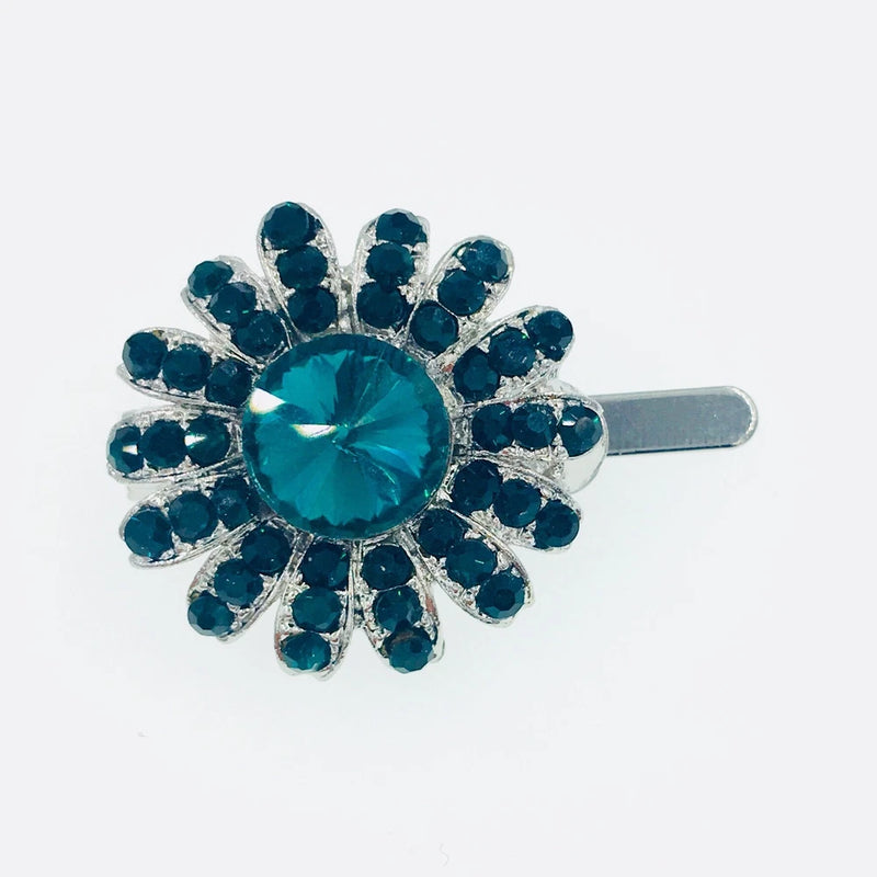 Green rhinestone sunflower hair clip with crystal center and metal barrette
