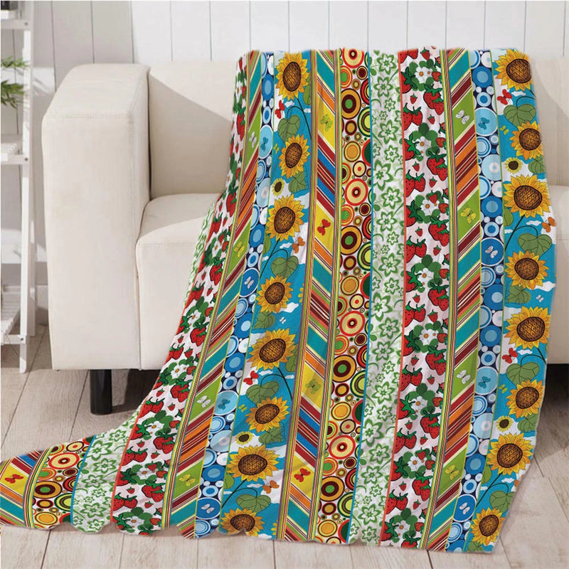 Sunflower plush fleece blanket with colorful vertical stripes, draped over a sofa