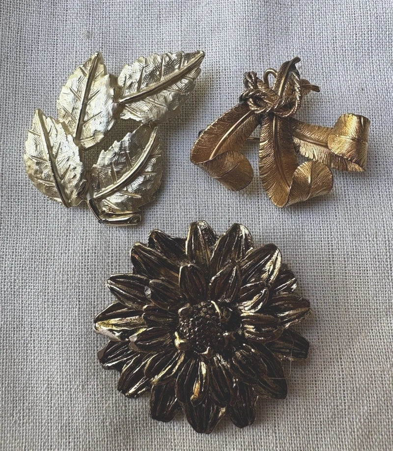 Vintage Gold Tone Brooches Lot 3 Unmarked: Leaves Cluster, Feathers, Sunflower Sunflower